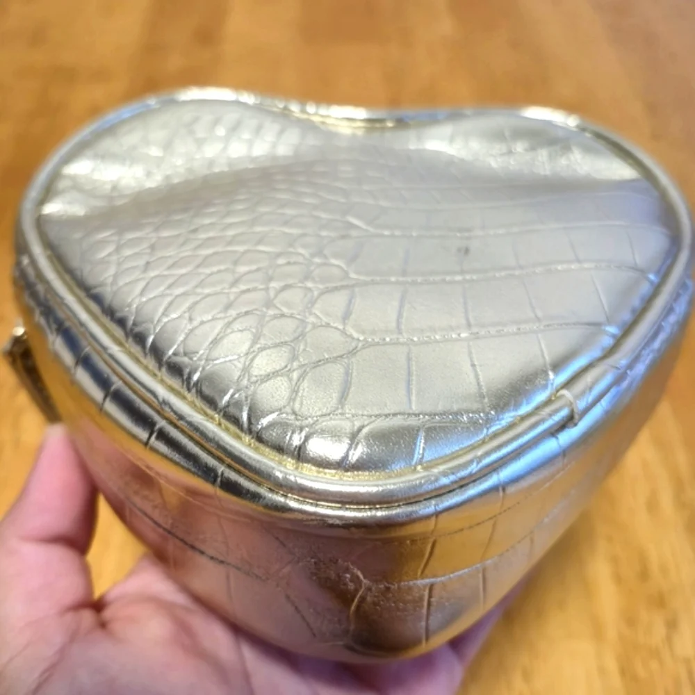 Cle de Peau golden Quilted Cosmetic Bag‎